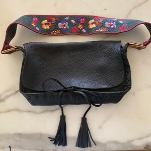 NWT Miu Miu Black leather clutch with beautiful detail embroidered flower strap.